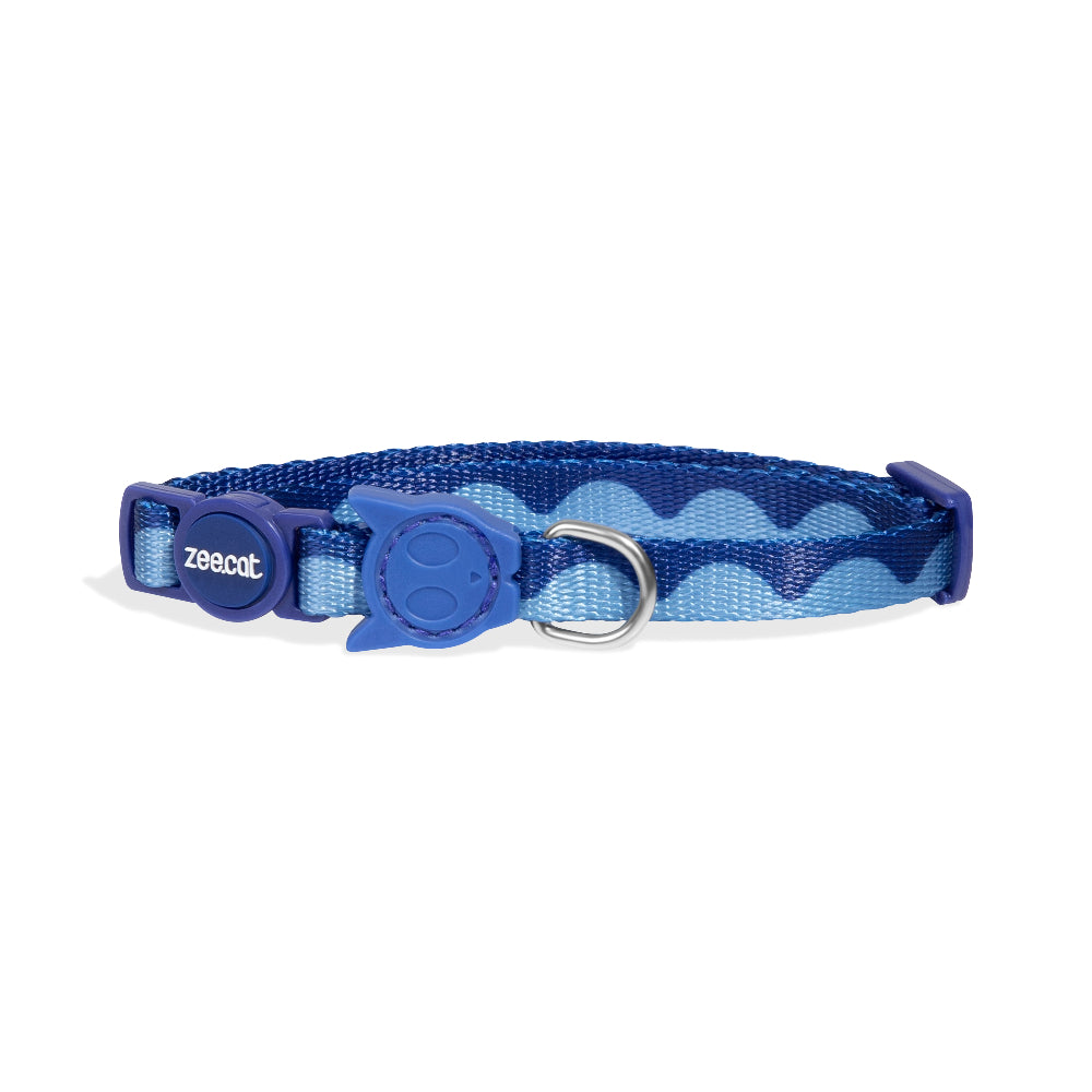 Blue patterned dog collar with a branded clasp on a white background