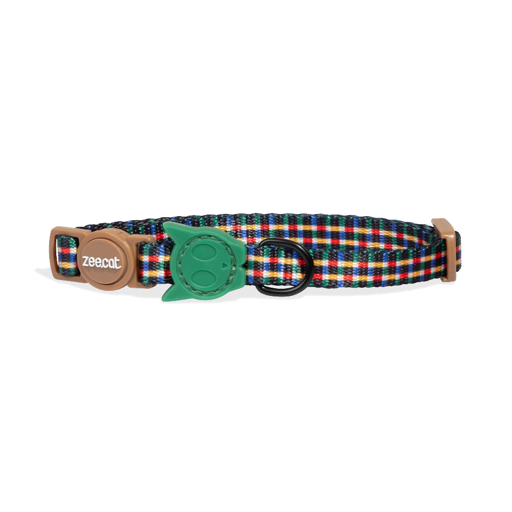Plaid patterned dog collar with a green tag and brown buckle on a white background